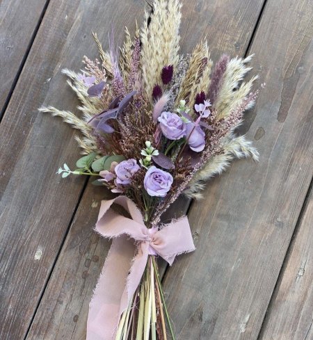 Bridal bouquet and candles