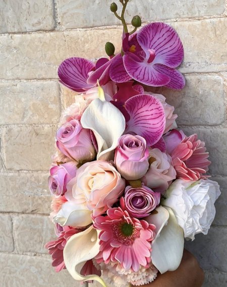Bridal bouquet and candles